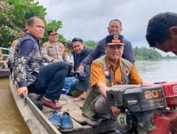 Pj Sekda Kampar Lakukan Peninjauan TPS yang Terdampak Banjir di Kecamatan Siak Hulu