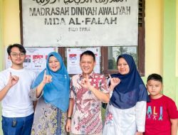 Penjabat Bupati Kampar Hambali Bersama Keluarga Berikan Hak Suara pada Pilkada Serentak 2024