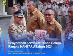 Penjabat Bupati Kampar Menghadiri Upacara Sekaligus Penyerahan Sertifikat Tanah Dalam Rangka HANTARU Ke 64 Tahun 2024